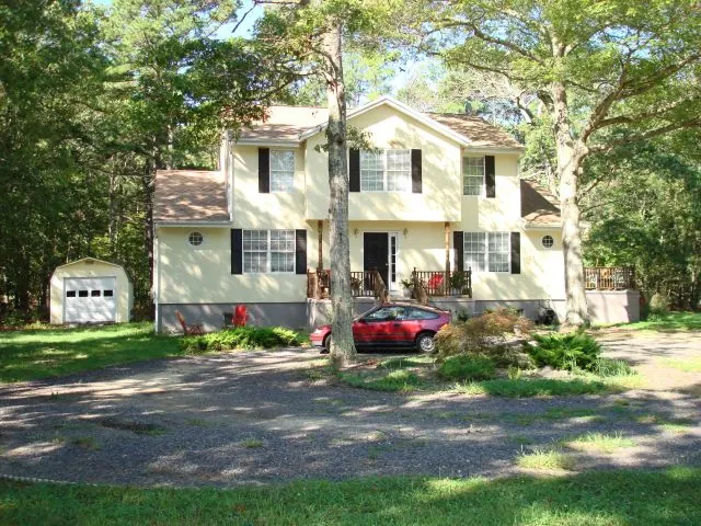 Two-story house on a wooded lot